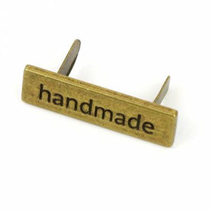 Serif Handmade Label 1-3/8 Inch - Antique Brass